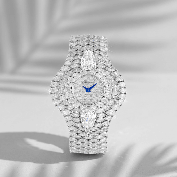 Ladies' watch crafted in Ethical white gold set with over 46 carats of brilliant, marquise, and pear-shaped diamonds - including two 3-carat pear-shaped diamonds framing the dial. 